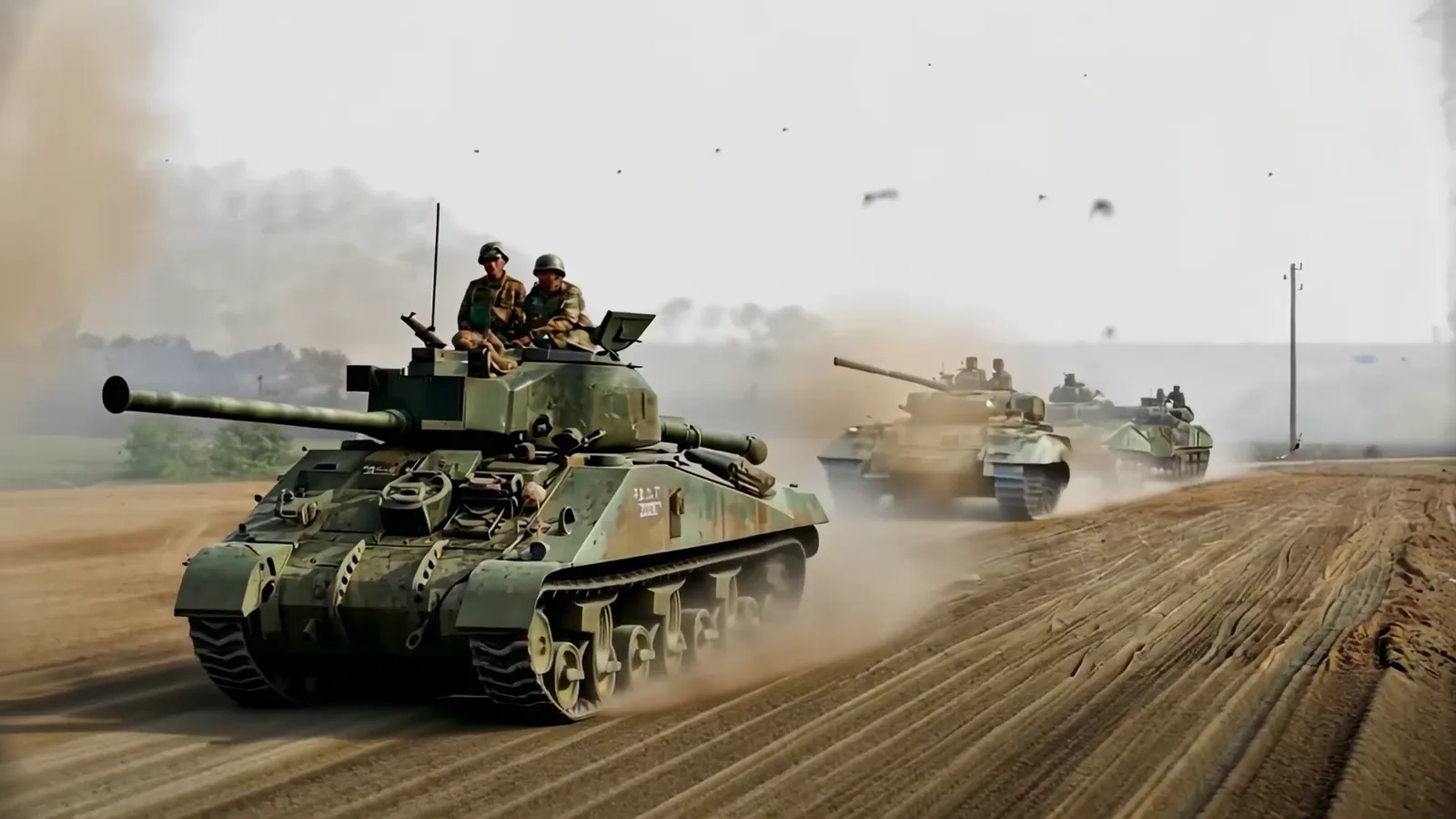 Tanks driving along a sandy road