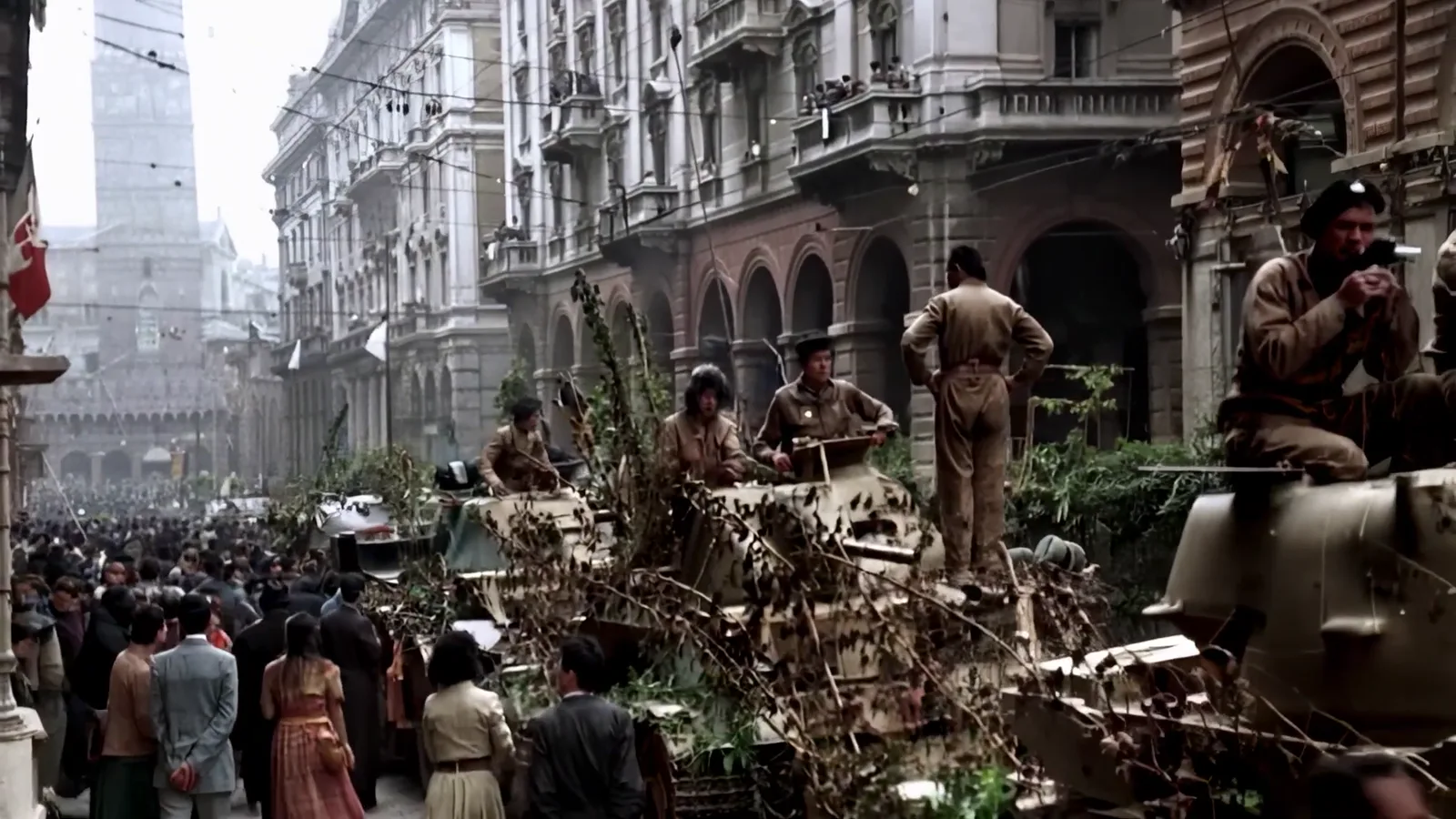 A crowd greets soldiers on tanks in a city
