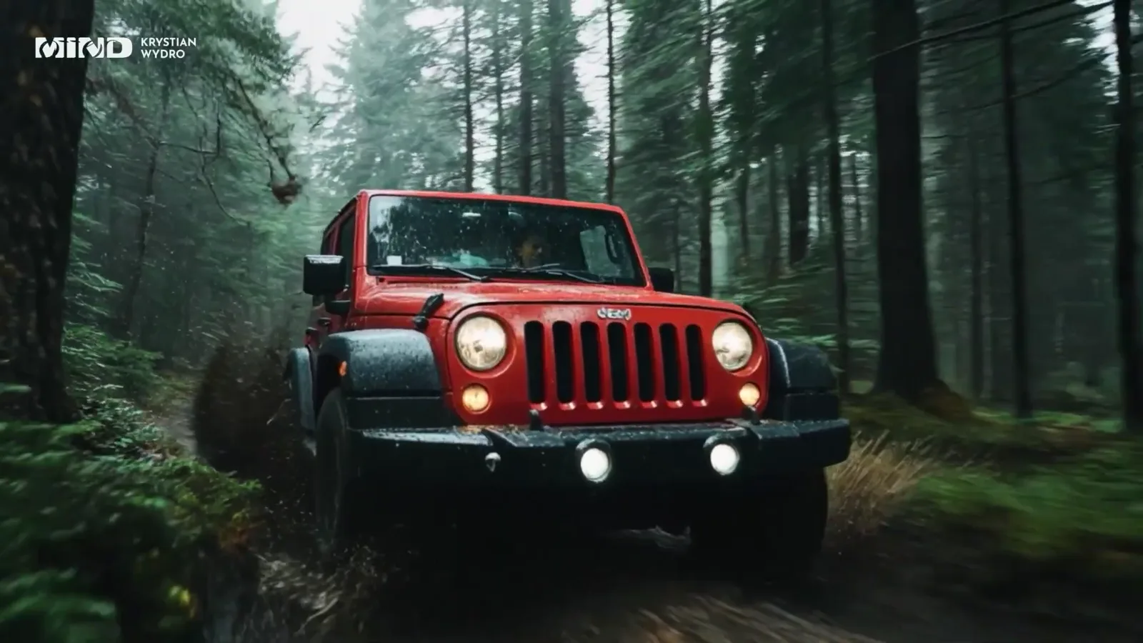 A red off-road car in a rainy forest