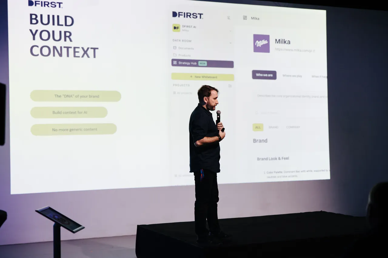 Krystian Wydro presenting DFirst on stage at BytePlus AI Day in Warsaw
